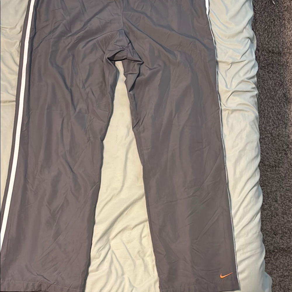 Kids grey & orange Nike track pants